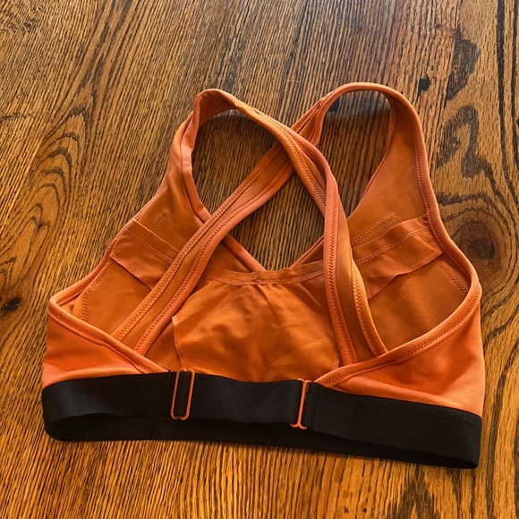 Orange nike criss-cross sports bra. Medium, great condition - Picture 2 of 3